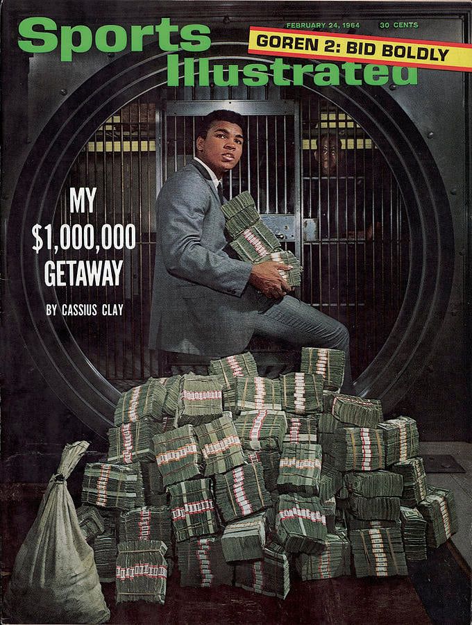 Muhammad ali with money at bank vault